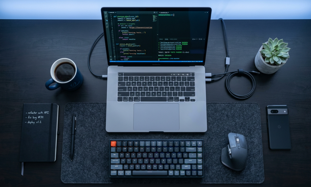 Developer workspace for AI-assisted product development with multiple screens showing code